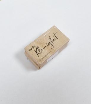 Holzstempel nur eine Kleinigkeit (klein)
