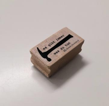 Holzstempel "es gibt immer was zu tun" mit Hammer (klein)