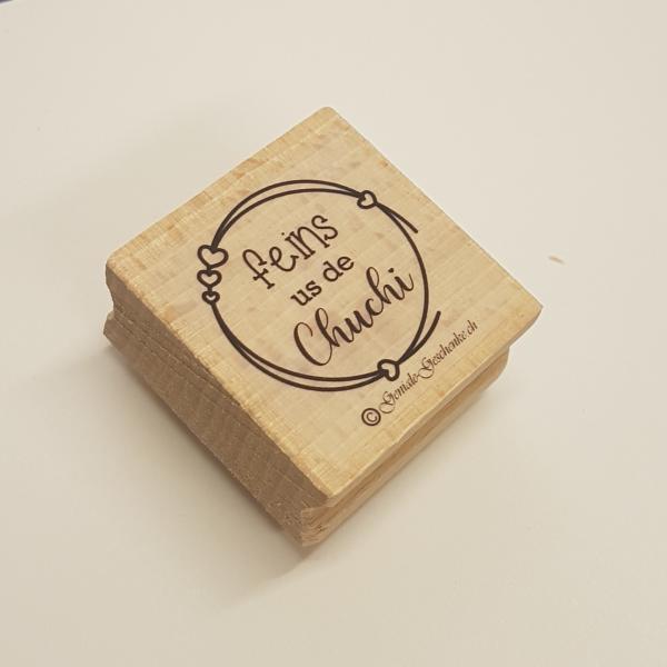 Holzstempel "feins us de Chuchi"